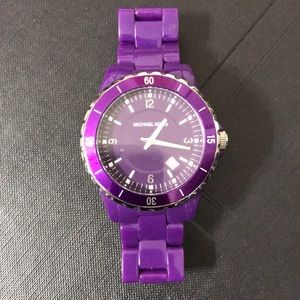 Authentic Michael Kors purple watch.